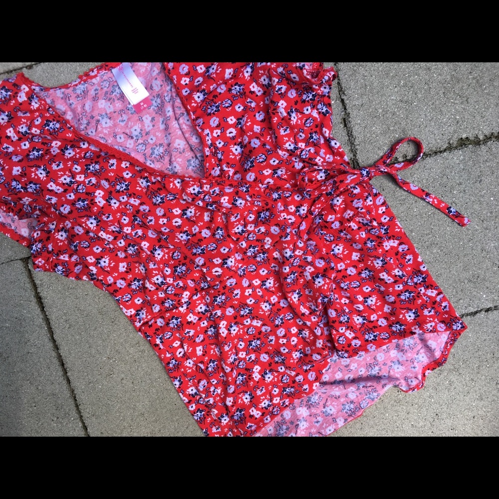 Woman’s red floral top Size: medium